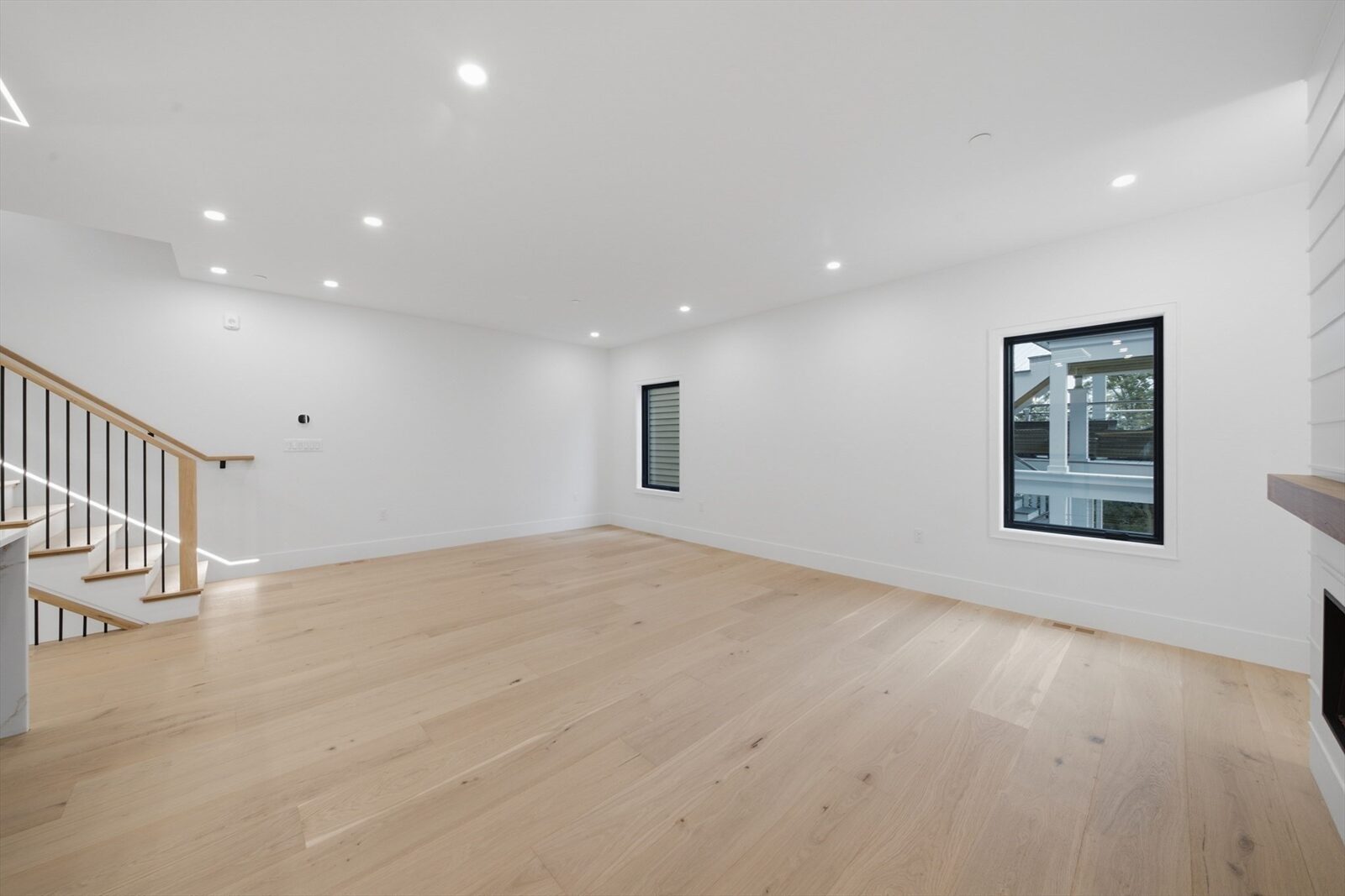 Living area looking toward the stair at 421 East Sixth Street, Residence 3