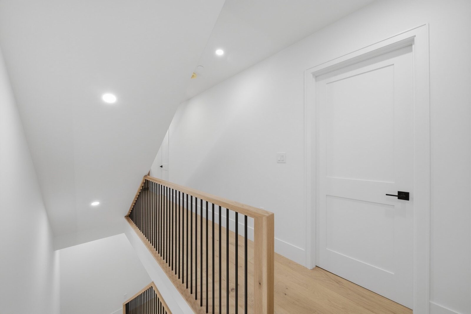 Upper-level landing at 421 East Sixth Street, Residence 3