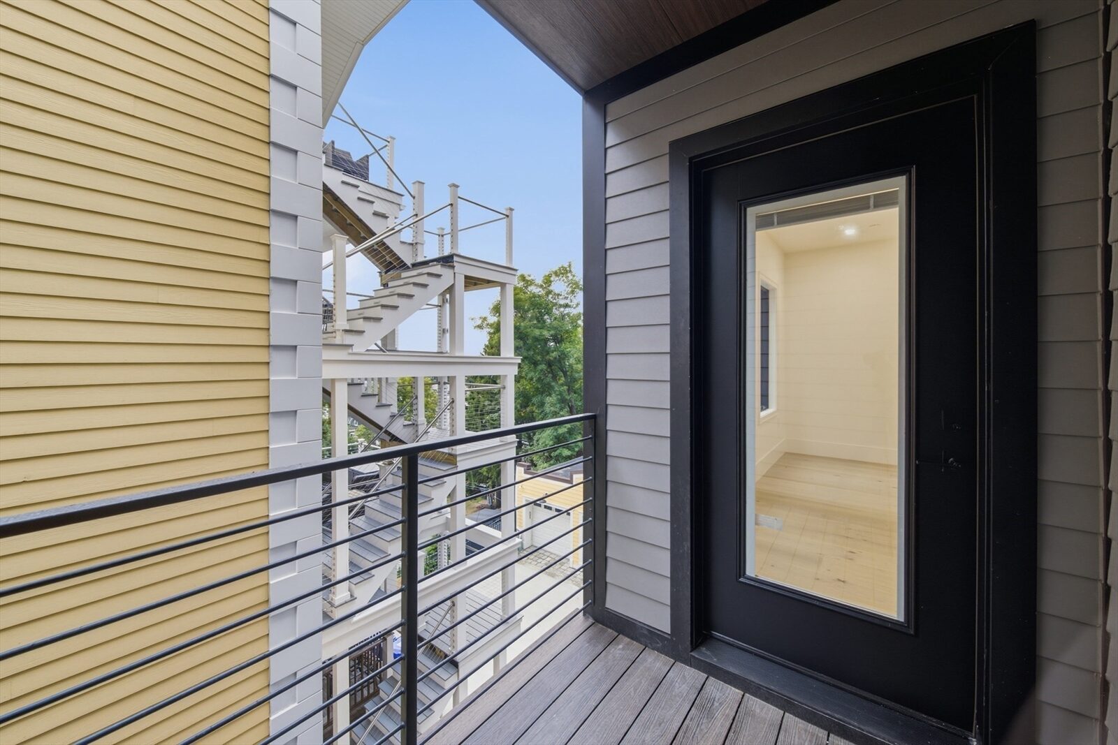 Covered deck and stair at 421 East Sixth Street, Residence 3