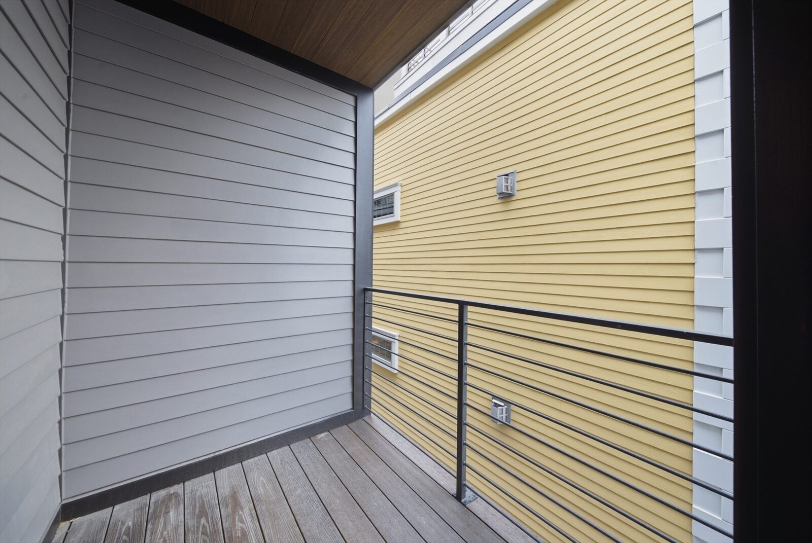 Covered deck at 421 East Sixth Street, Residence 3
