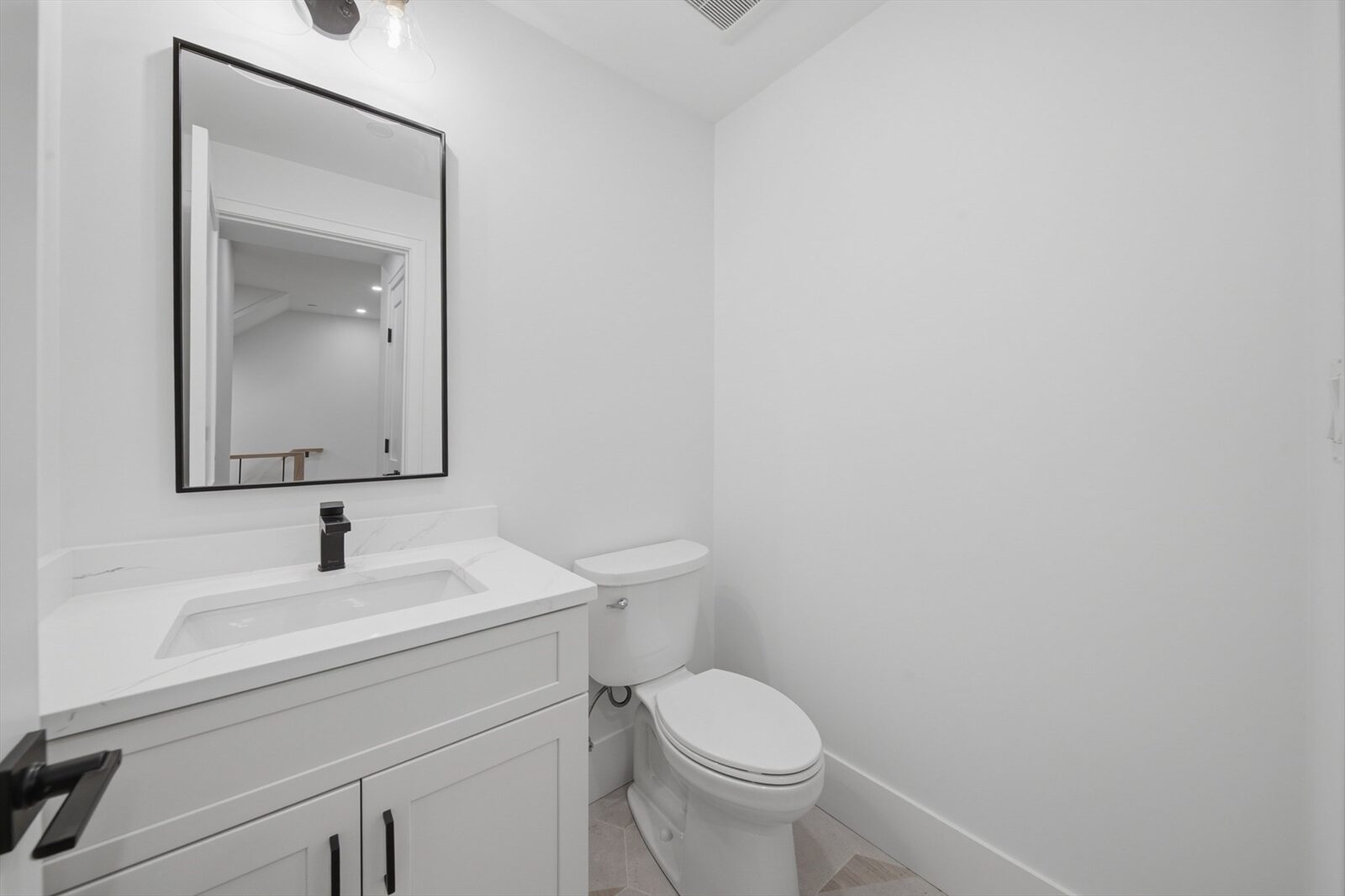 Powder room at 421 East Sixth Street, Residence 3