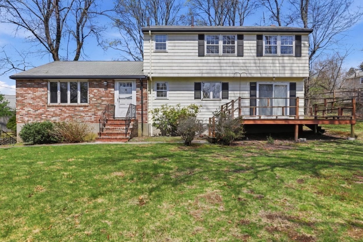 Rear exterior of 306 Fairmount Avenue, a five-bedroom colonial in Hyde Park sold May 2026
